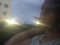 Pretty Milf Smoking Cigarettes In Car (What brand of cigarettes does she smoke)?