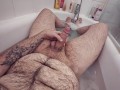 I jerk off in the bathtub and cum on my bear belly
