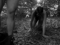 Naked submissive slut taken for a walk on a leash in forest