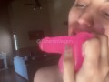 She enjoys sensually sucking her Dildo