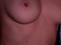 Caressing the beauty's breasts and licking her nipples. Perfect tits and loud moans