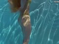 4K beauty swims and strips showing her tight pussy