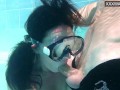 Cumshots underwater with two horny people
