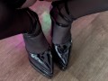 in stockings with heels spits on her legs, wet nylon feet