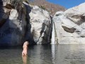 Naked blonde girl explores waterfall- relaxing and beautiful