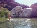 Naked blonde girl explores waterfall- relaxing and beautiful