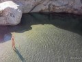 Naked blonde girl explores waterfall- relaxing and beautiful