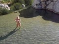 Naked blonde girl explores waterfall- relaxing and beautiful