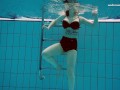 Enjoy big bouncy tits of Dashka in the swimming pool