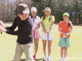 Cute Asian teen girls play a game of strip golf