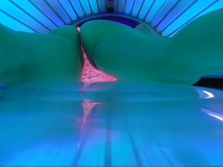 CAUGHT GIRL MASTURBATE AT SUNBED