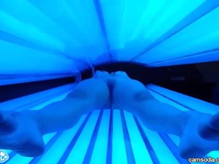 teen latina college student gives lesbian pussy a massage in tanning bed