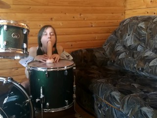 Dildo Riding on DRUMS! Drummer doesnt know about it :)