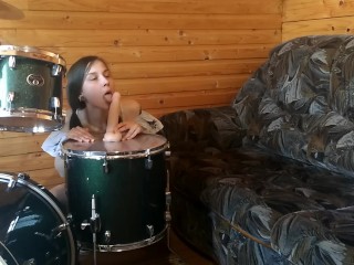 Dildo Riding on DRUMS! Drummer doesnt know about it :)