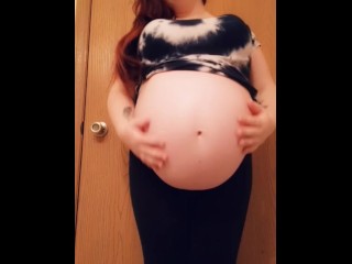 Tiny mama gives a sneak peak of her unborn while baby daddy showers