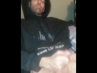 Mature male in black Eminem hoodie moaning.