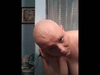 Topless bald girl razor shave cleanup