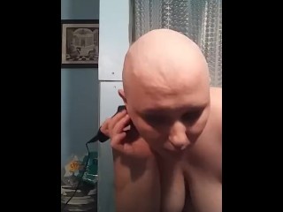 Topless bald girl razor shave cleanup