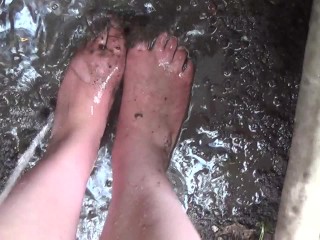 DIRTY FEET IN THE MUD