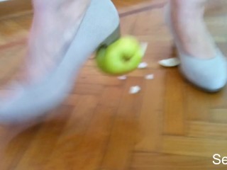 Feet crushing fruit