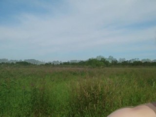 Nude walk through the grass, naked girl in the countryside