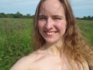 Nude walk through the grass, naked girl in the countryside