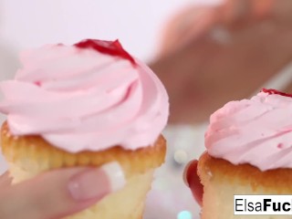 Elsa and Daisy play with some cupcakes and each other