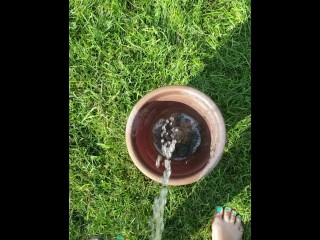 Girl Fills Planter With Piss Outside