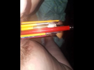 Pussy stuffed with paintbrushes