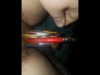 Pussy stuffed with paintbrushes