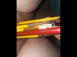Pussy stuffed with paintbrushes