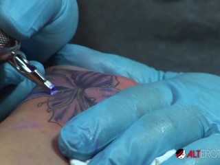 Shyla Stylez gets tattooed while playing with her tits