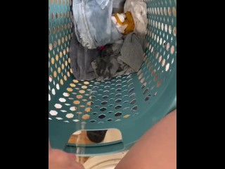 naughty pissing in the laundry basket