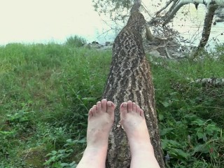 I walk in slippers in the forest. POV.