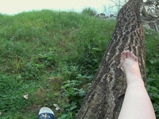 I walk in slippers in the forest. POV.