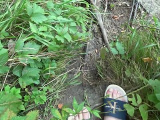 I walk in slippers in the forest. POV.