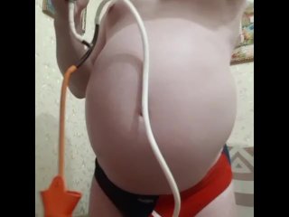 My inflation triple machine: a rubber heating pad, a pump and my huge belly🎈😤🏐More -- on my OF💥