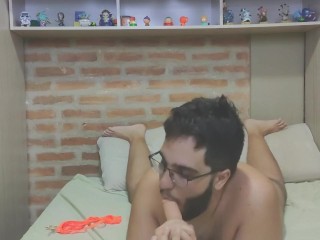 Chubby boy having fun with his rubber dick and widening his ass