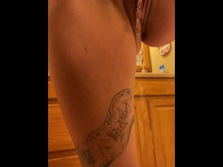 Piss Slut pissing in her garbage can