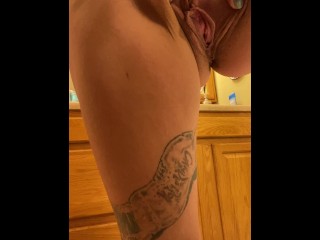 Piss Slut pissing in her garbage can