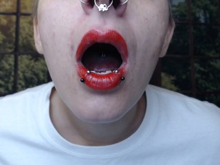 Lip Nose Piercings Applying Red lipstick