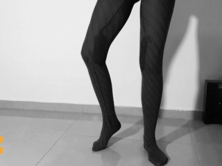 Wetting my dark transparent pantyhose