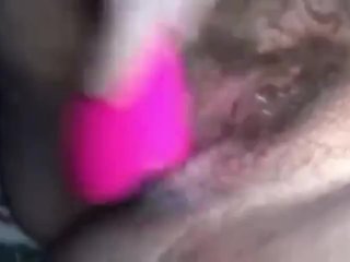 Pink toy cock makes her cum