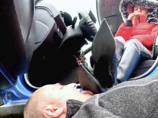 Worship and licking boots in public