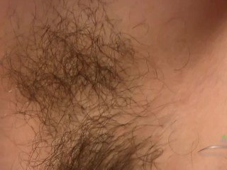 Extremely hairy chick plays with all her body hair, from legs to pits to her massively thick bush.