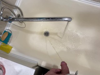 Pissing neatly in the bathroom with a big beautiful dick POV