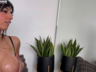 BTS: Aaliyah Yasin oils up before some customs filming