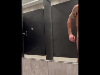 Jock jerks cock in gym locker room after workout