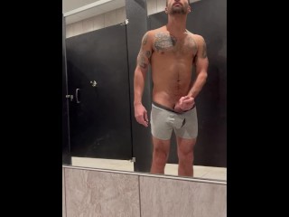 Jock jerks cock in gym locker room after workout