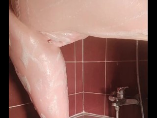 Having fun in the shower with a soapy finger fuck